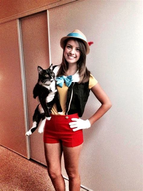 a woman is holding a cat and posing for a photo with the caption best 25 homemade disney ...