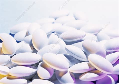 Calcium pills - Stock Image - M627/0121 - Science Photo Library