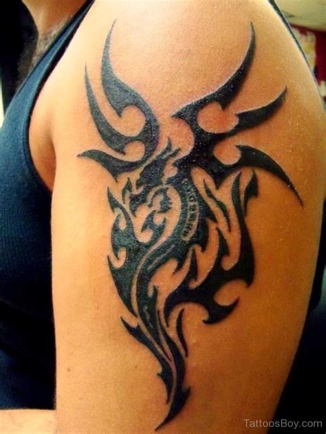 Tribal Dragon Tattoo On Shoulder - Tattoos Designs