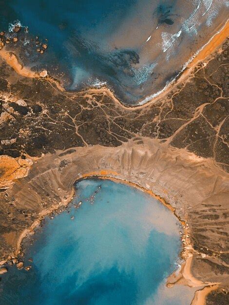 Premium Photo | Aerial view of golden bay beaches in malta