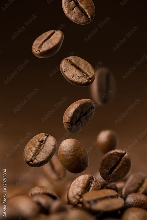 Coffee beans falling Stock Photo | Adobe Stock