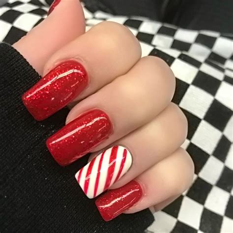 Candy cane nails | Candy cane nails, Winter nails acrylic, Cat eye nails