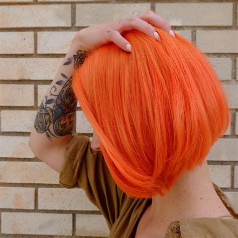 Vibrant Neon Orange Hair