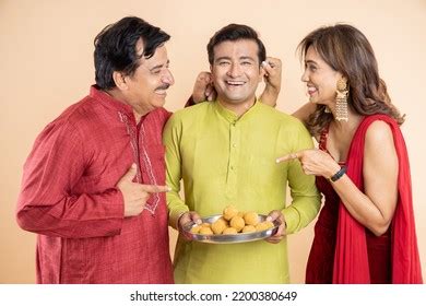 Happy Indian Family Celebrating Diwali Festival Stock Photo 2200380649 ...