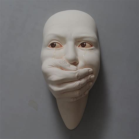 Surreal Ceramic Sculptures Of People in Pain By Johnson Tsang