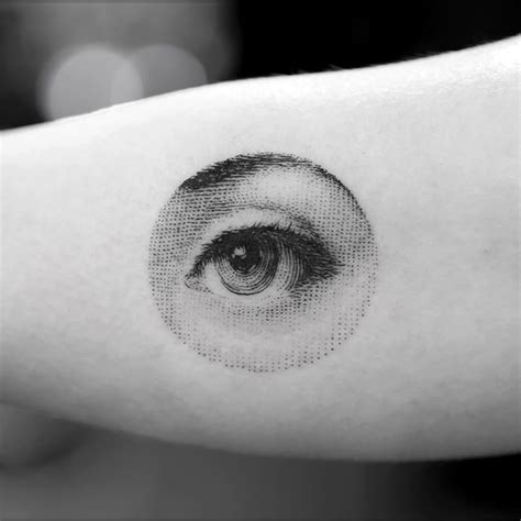 Incredibly realistic eye tattoo - Tattoogrid.net