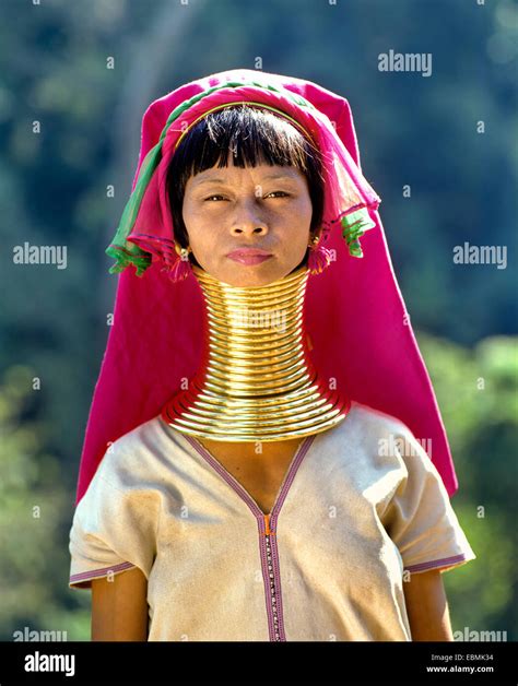 Long-necked woman of the Padaung mountain tribe, also known as giraffe women, wearing neck rings ...