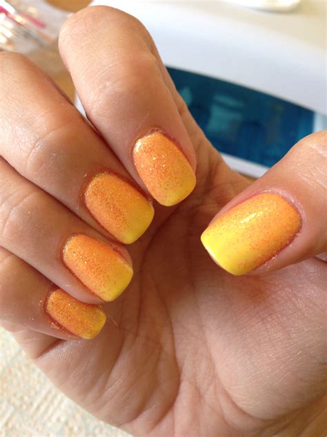 Shellac cnd bicycle yellow nails with orange neon glitter overlay. Love ...