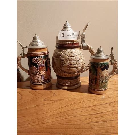 3 Beer Steins with Pewter Lids - Beck Auctions Inc.