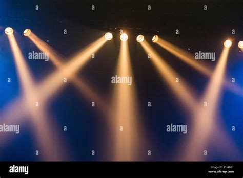 theatre spot lights lighting on stage Stock Photo - Alamy