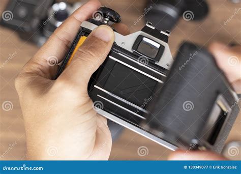 Placing Photographic Roll in a Camera Stock Image - Image of button, photographic: 130349077