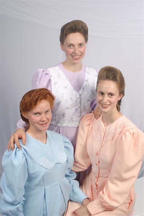 Sisters Rachel Jeffs and her two sister wives in a joyful moment