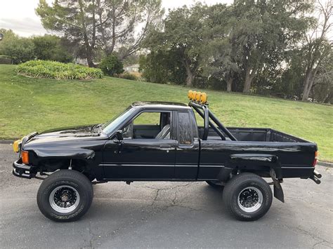 Lifted 1985 Toyota Pickup 4x4 Looks Like Marty McFly's Truck, Bidding ...