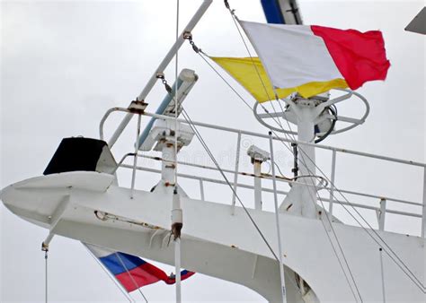 State Flags Raised on the Mast of a Merchant Ship in the Ports of Call. Stock Image - Image of ...