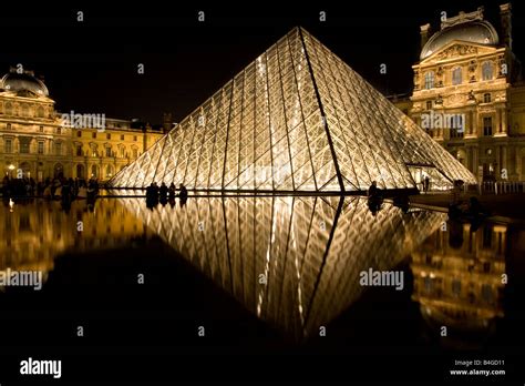 Louvre Museum at night Stock Photo - Alamy