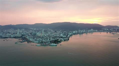 Aerial marvelous color sunset over Penang Island. 9007226 Stock Video at Vecteezy