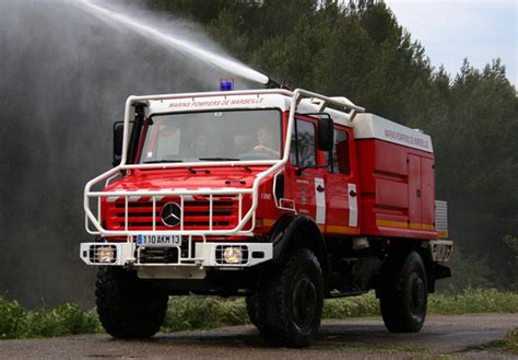 Photos of Mercedes-Benz Unimog U5000 Feuerwehr 2000–13