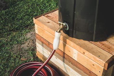 DIY Rain Barrel: How to Make a Cheap Rain Barrel With a Spigot at Home - ManMadeDIY