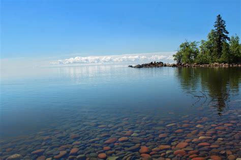 Clouds floating on the Lake Superior, Minnesota, taken July 2017 [OC][5146x3430] : r/EarthPorn