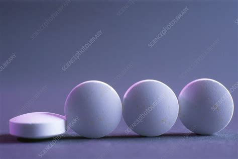 Calcium pills - Stock Image - M625/0901 - Science Photo Library