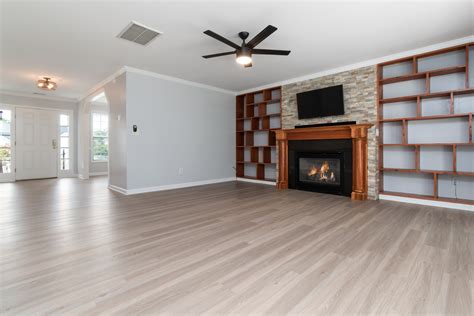 An Empty Living Room with a Fireplace · Free Stock Photo