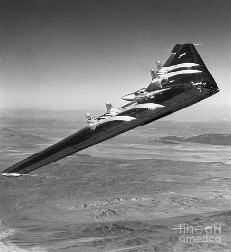 Yb-49 Flying Wing Over California by Bettmann