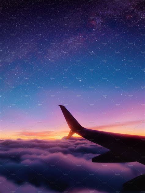 Airplane In The Sky At Night