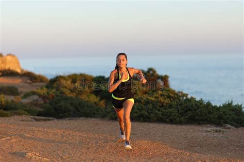 Runner Running at Sunset on the Beach Stock Photo - Image of female ...