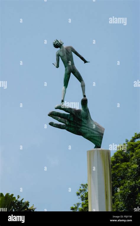 Hand of God statue—a replica of "hand of God" sculpture originally made by Swedish artist ...