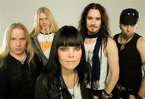 Posed studio group portrait of Finnish metal band Nightwish. Left to... in 2021 | Studio ...