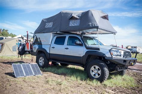 Truck Camping Guide: Truck with Attached Tent and Solar Panel