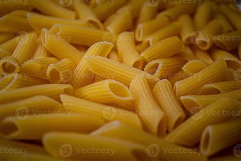 Dry Italian pasta background healthy food photo 22466764 Stock Photo at Vecteezy