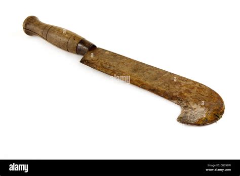 Rusty old machete knife over white Stock Photo - Alamy