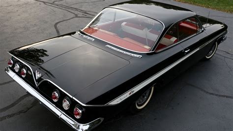 Black vintage Chevrolet Impala - Old car