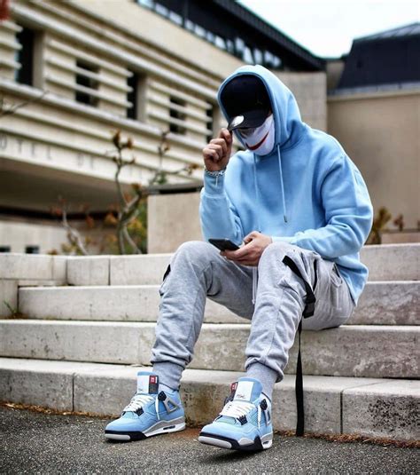 The Air Jordan 4 Retro University Blue features the iconic UNC colourway with a full university ...