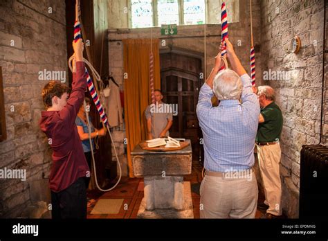 Bell ringing for a wedding ceremony at Church of the Holy Rood, Shiilingstone village, Dorset ...