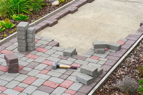 Polymeric Sand Vs Regular Sand: Which Is Best For Pavers? - PavingPlatform.com