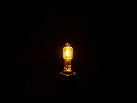 Premium Photo | Glow of a halogen bulb in the dark