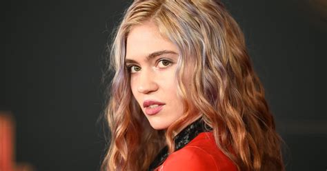 Grimes's Tattoo Collection Includes a Massive Leg and Back Tattoo | Flipboard