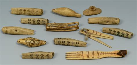 Lot 445: Large collection Inuit Bone & other carvings