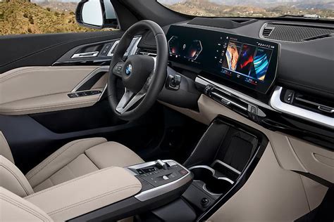 The all-new 2023 BMW X1 gains a modern, tech-focused interior featuring the new BMW Curved ...