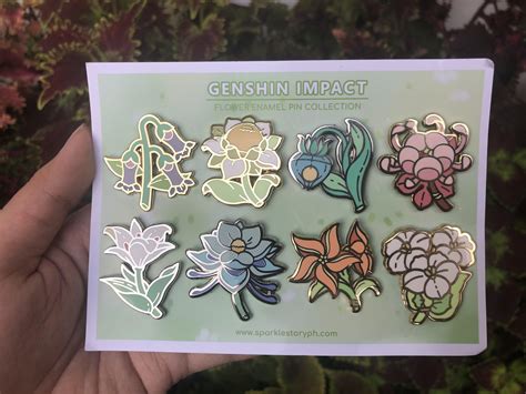 Some genshin flower pins I got as a gift : r/Genshin_Impact