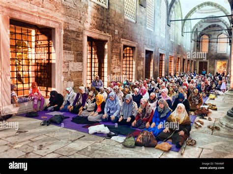 Islamic women praying at Blue Mosque for the beginning of Ramadan ...