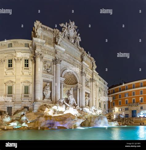 A picture of the Trevi Fountain at night Stock Photo - Alamy