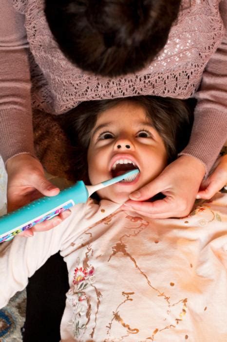 The Easy Way To Brush Baby And Toddler Teeth Without A Struggle | Pediatric Dentistry Mission ...