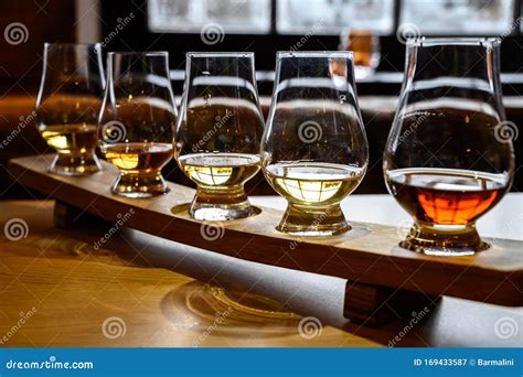 Scotch Whisky, Tasting Glasses with Variety of Single Malts or Blended Whiskey Spirits on ...