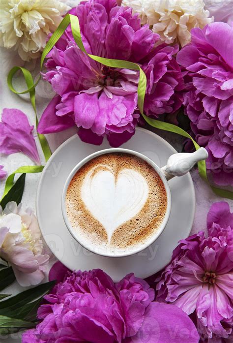 Pink peony flowers and cup of coffee 5037613 Stock Photo at Vecteezy