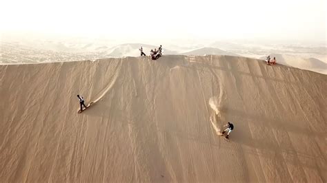 Sandboarding the Peruvian Sand Dunes of Huacachina - YouTube