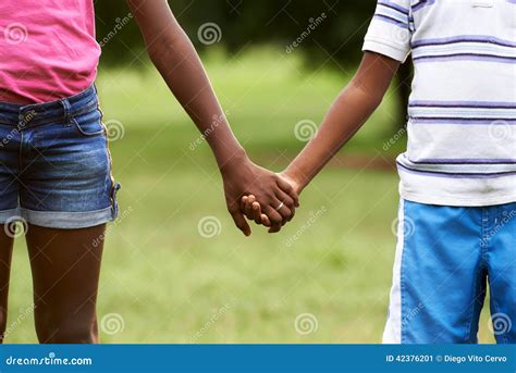 Children In Love Black Boy And Girl Holding Hands Stock Image - Image: 42376201