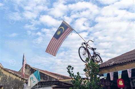 Malaysia flag and Penang state flag waving 21647451 Stock Photo at Vecteezy